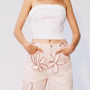 With Jean Carla white corset top